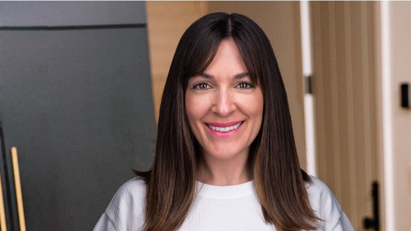 Headshot of Anna Boyer wearing white shirt